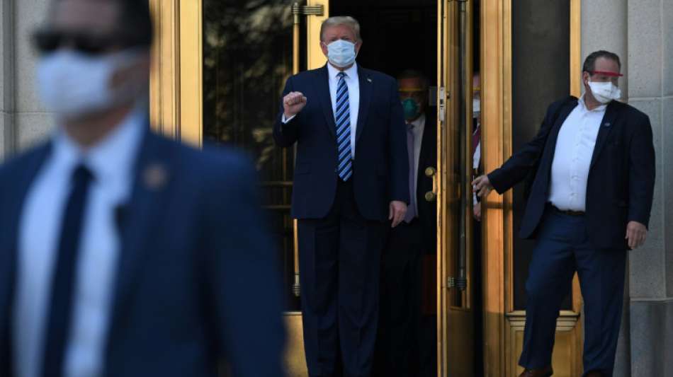 Trump verlässt Krankenhaus - und nimmt vor Weißem Haus Schutzmaske ab
