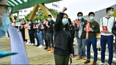 Hongkong: Krankenhaus-Mitarbeiter streiken für Grenzschließung
