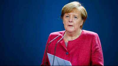 Merkel und Bürgermeister vereinbaren weitere Beschränkungen für Corona-Hotspots