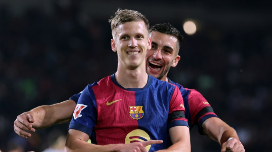 Barca cruise past Osasuna to bolster Liga title bid