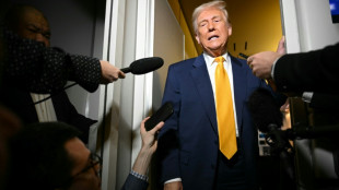 Trump downplays tariffs walk-back, says no country 'off the hook'