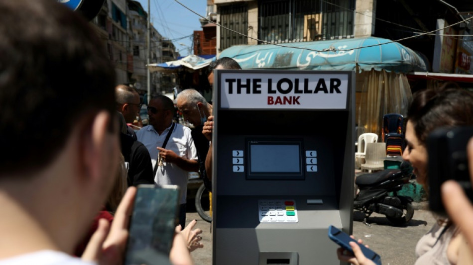 Lebanese activists launch mock 'lollar' currency