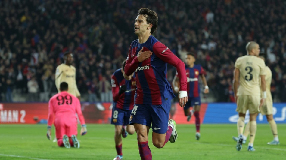 Cancelo and Felix fire Barca past Porto into Champions League last 16