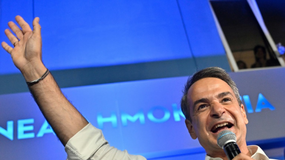 Mitsotakis back as Greek premier after election landslide