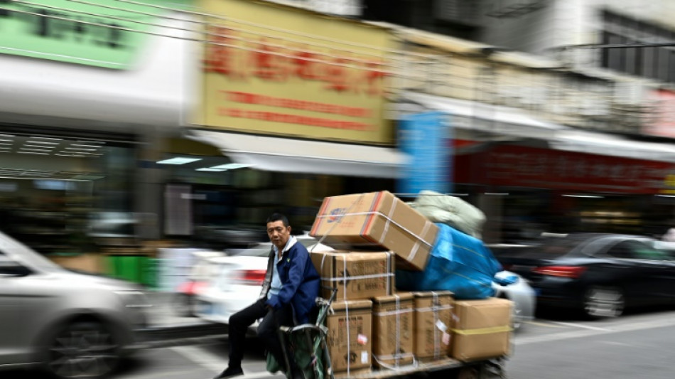 Trumps Z&ouml;lle: Chinesische H&auml;ndler auf einer Messe in Shanghai suchen Auswege 