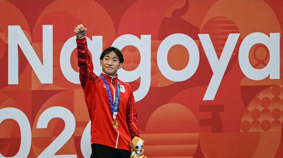 Japan swimmer Ohashi, 17, shrugs off Covid to smash world record