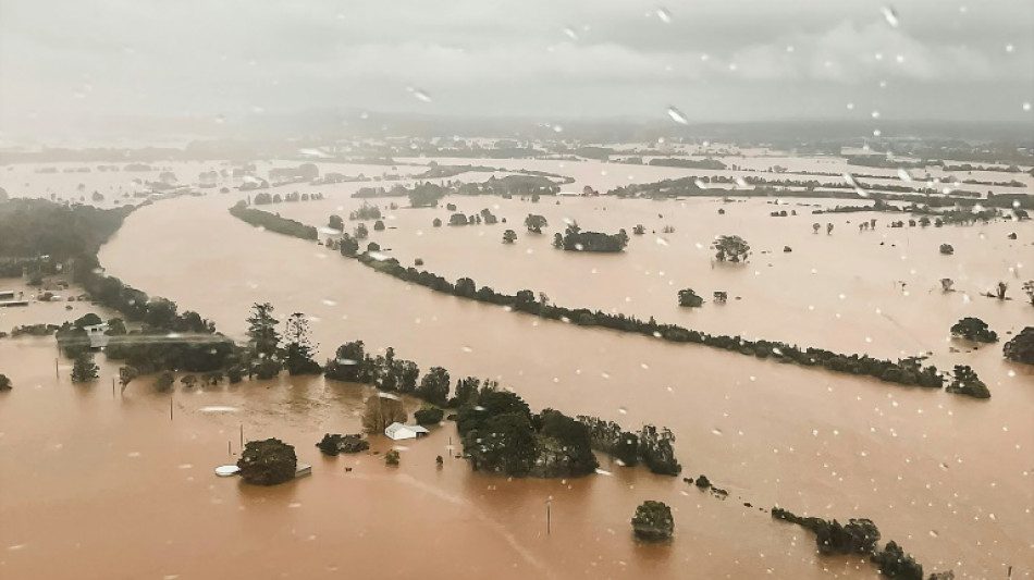 One dead, 50,000 stranded in eastern Australia floods
