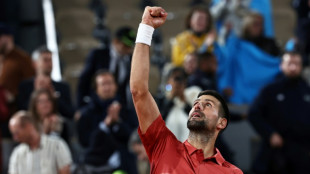 Djokovic shrugs off troubles in winning start at French Open 