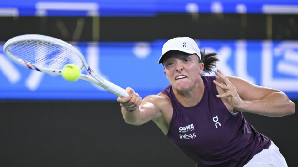 Swiatek moves into Wuhan semi-finals
