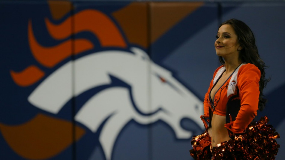NFL owners approve Broncos sale to Wal-Mart heir Walton