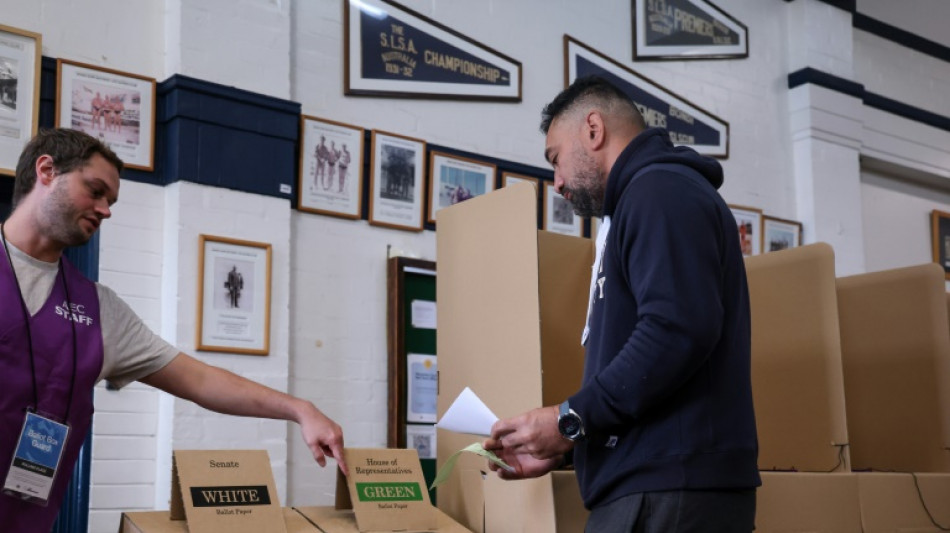 Polls open in Australian vote swayed by inflation, Trump