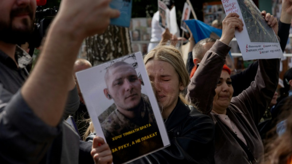 Ukrainians beg for news of missing soldiers as prisoners return