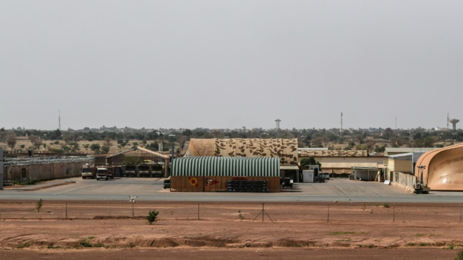 Heavy gunfire rocks Niger capital, state TV signal cut