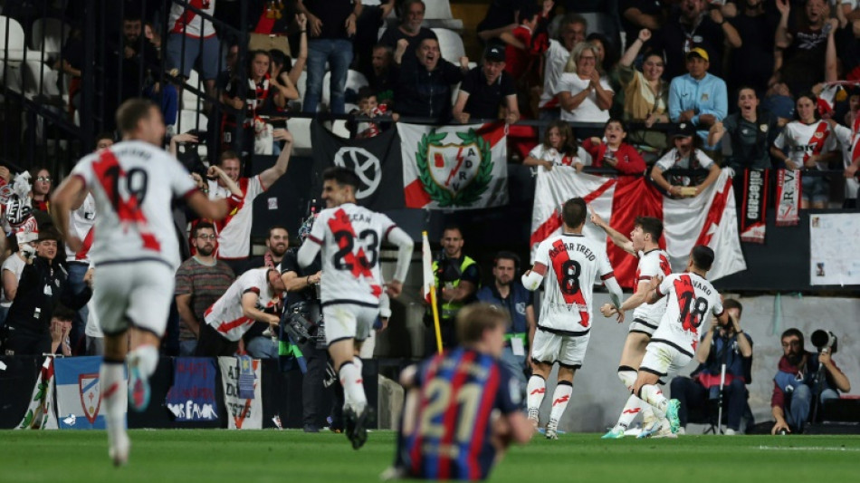 Liga leaders Barcelona crash to defeat against Rayo