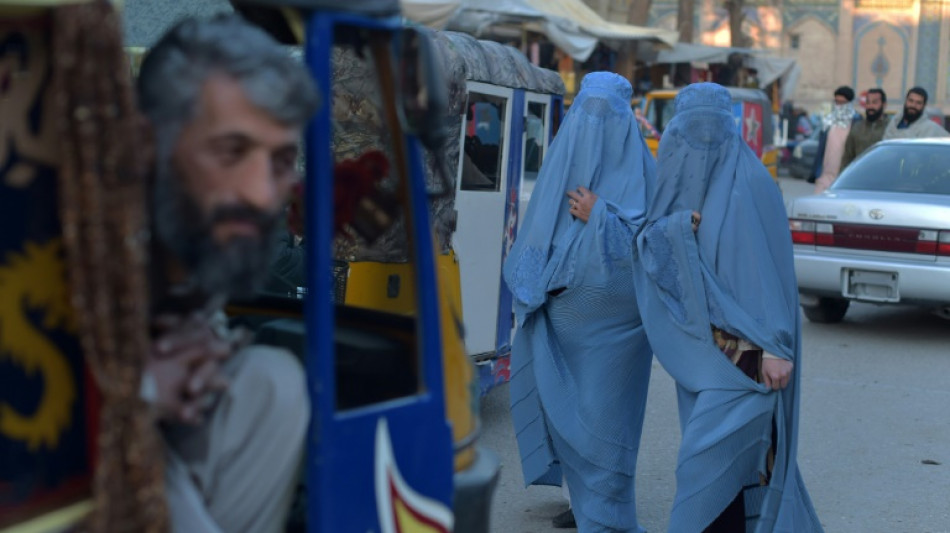 Taliban order Afghan women to cover faces in public