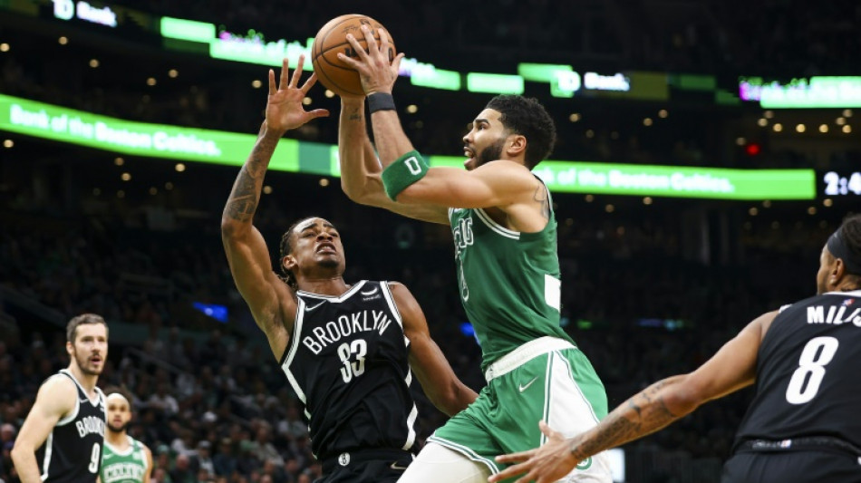 Tatum half-century sparks Celtics over Nets