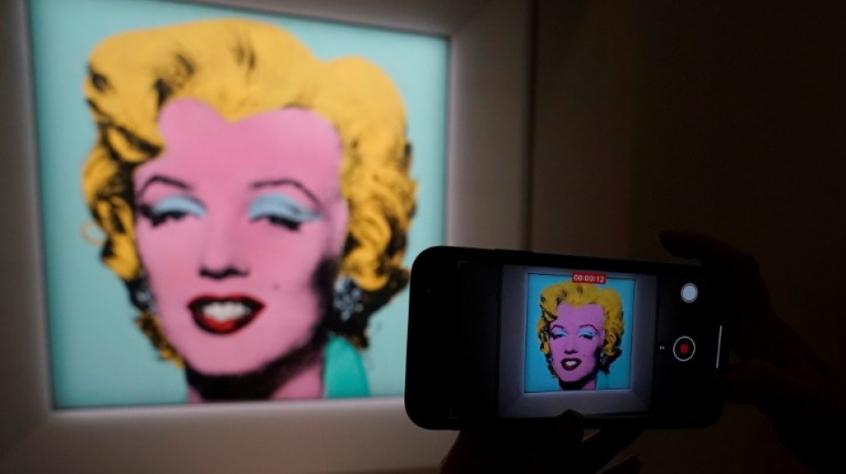 Warhol portrait of Marilyn Monroe fetches record $195 mn: Christie's