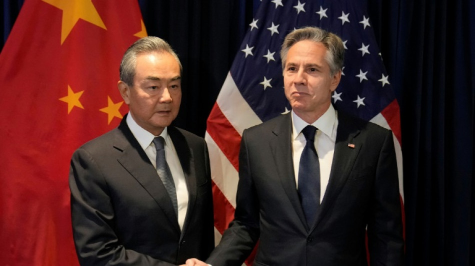 Wang tells Blinken to 'work with China' on improving US ties