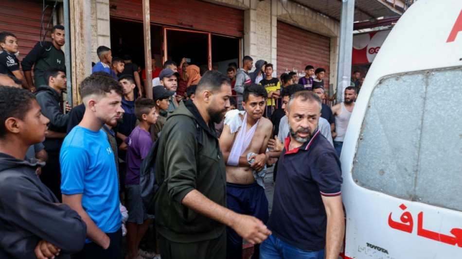 Gaza rescuers say Israeli fire kills 22 near aid site as truce talks falter