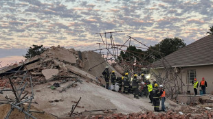 Rescuers search for survivors in deadly S.Africa building collapse