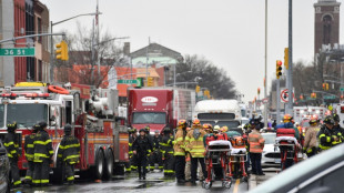 Un homme portant un masque &agrave; gaz tire dans le m&eacute;tro de New York, 16 bless&eacute;s