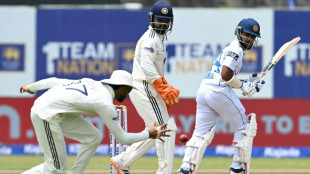 Dickwella, Dinusha hit fifties as Sri Lanka fight back