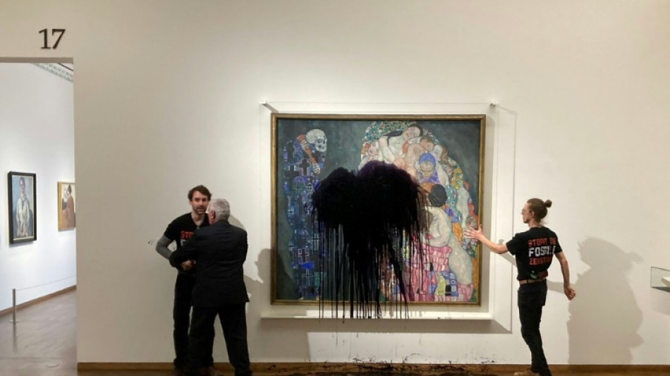 Protesters pour black liquid on Klimt masterpiece in Vienna