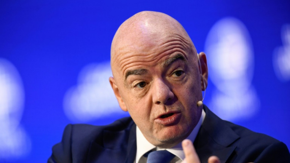Infantino says Qatar migrant workers take pride from hard work