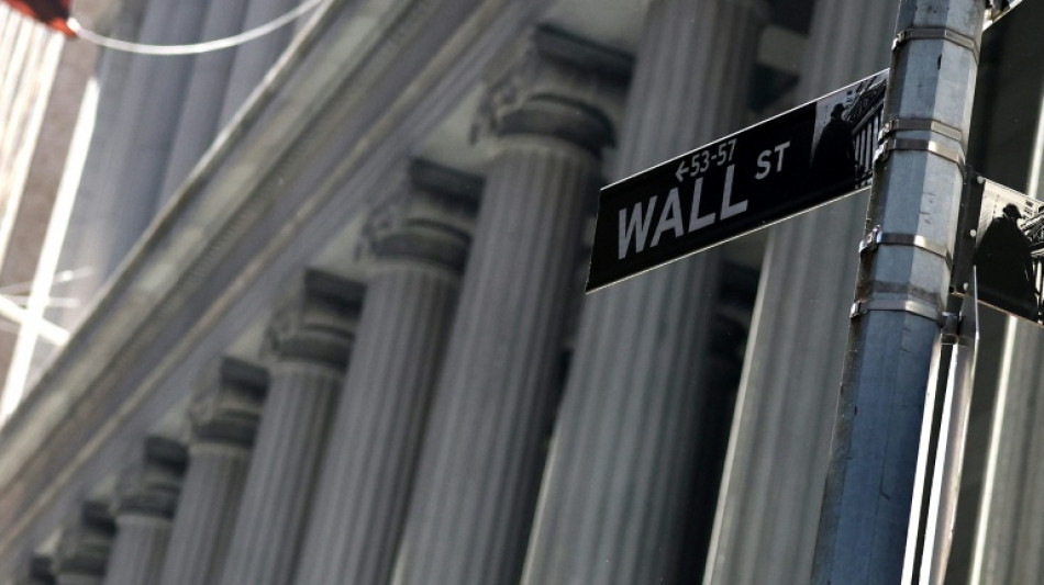 Wall Street termine en petite hausse et tente d'ignorer la perte du triple A am&eacute;ricain