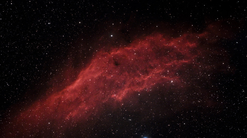 Una chitarra lanciafiamme fluttua nel cosmo, &egrave; una nebulosa