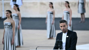 Greece hands Olympic flame to 2024 Paris Games hosts 