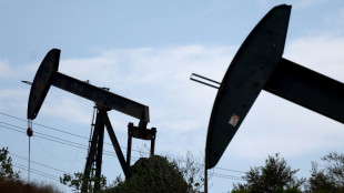Oil extends rally as supply fears build, dollar holds strength