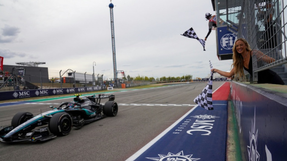 Antonelli wins US Grand but title triumph has to wait another week