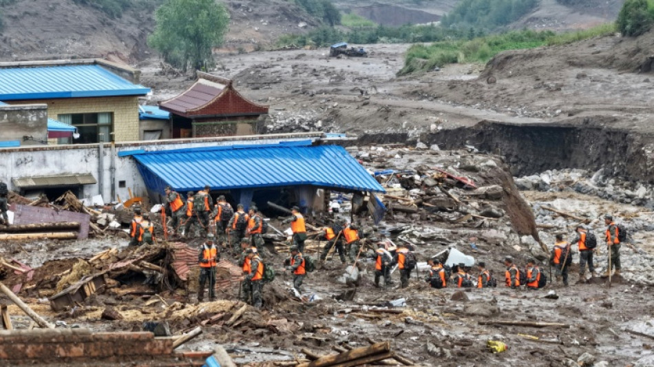 Death toll from northwest China floods rises to 13 