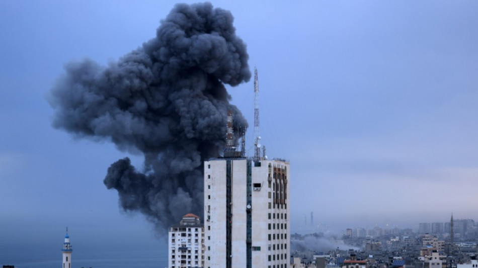 Israel battles Hamas, masses near Gaza after attack 'like 9/11'