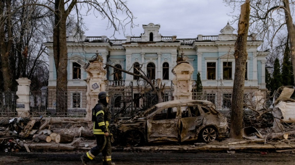 Ukrainians mourn Sumy strike victims as Russia denies targeting civilians