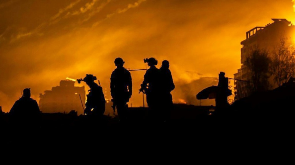 Israel forces search Gaza hospital as civilians stranded inside