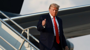 Trump arrested in racketeering case, mug shot taken