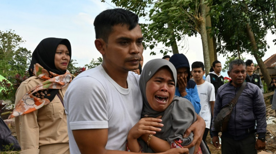Grief-stricken goodbye for Indonesia father killed in quake