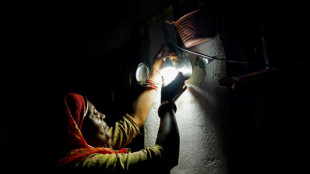 In India's mining belt, women spark hope with solar lamps