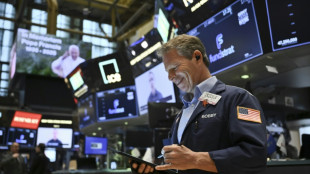 Asian markets mostly up as Trump soothes Fed fears