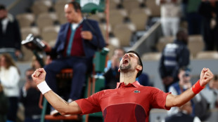 Djokovic into French Open last 16 after early hours five-set epic