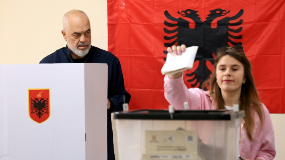 Albanians vote in election seen as key test of EU path