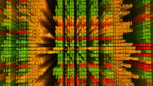 Asian markets struggle as traders prepare for higher rates