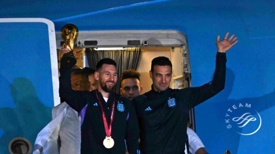 World Cup winners Argentina return ahead of welcome home party