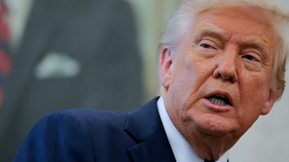 China says 'door open' to trade talks after Trump signals tariffs will fall