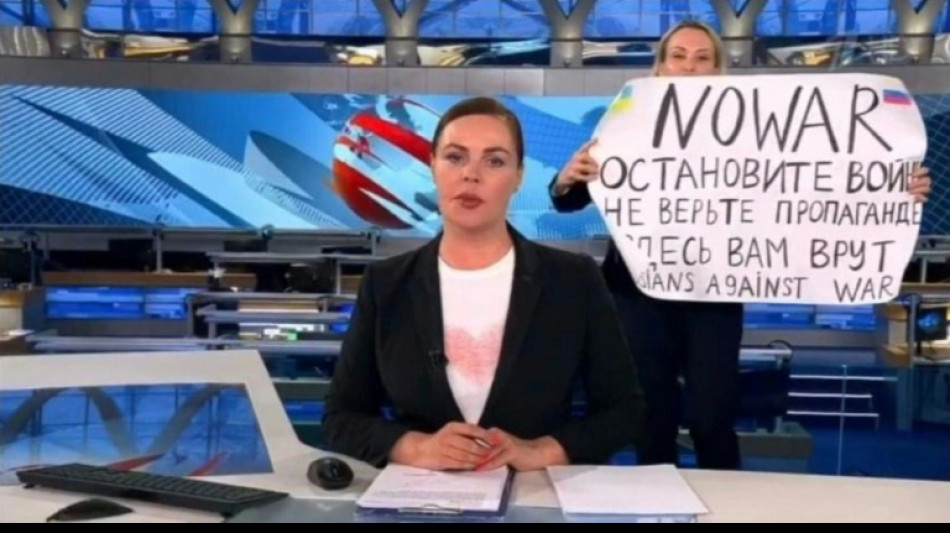 Russian TV protester caught in 'information war'