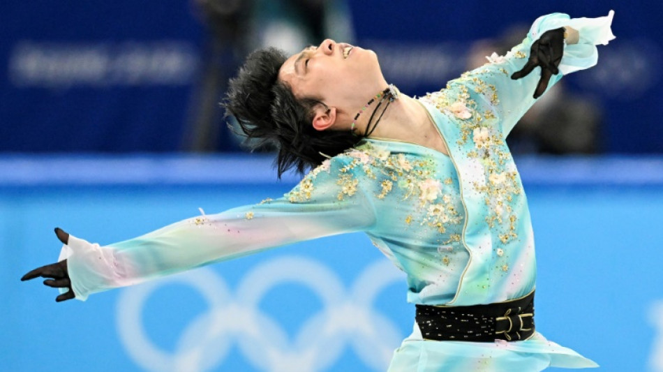 Injured skating star Hanyu to miss world championships