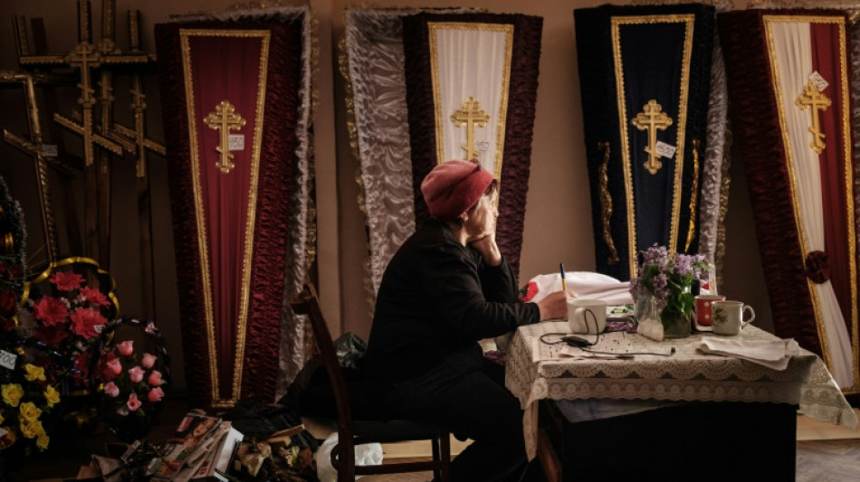 In eastern Ukraine, a funeral shop becomes a place of refuge 