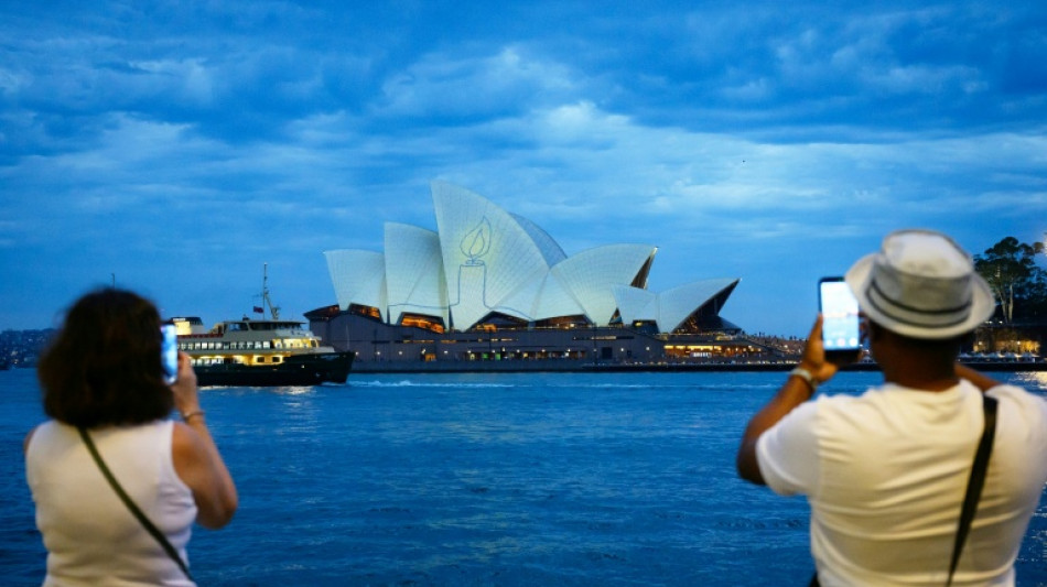 Australian state pushes tough gun laws, 'terror symbols' ban after shooting